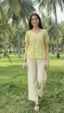 Northline Lime-Green Printed Cotton Co-ord Set for Women – Casual Summer Wear Kurta & Wide-Leg Pants